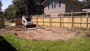 Swimming pool dirt work with the Bobcat